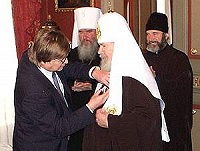 Святейшему Патриарху вручен почетный гражданский орден - Золотой крест «За служение обществу»